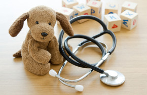 Pediatrics. Puppy toy with medical equipment